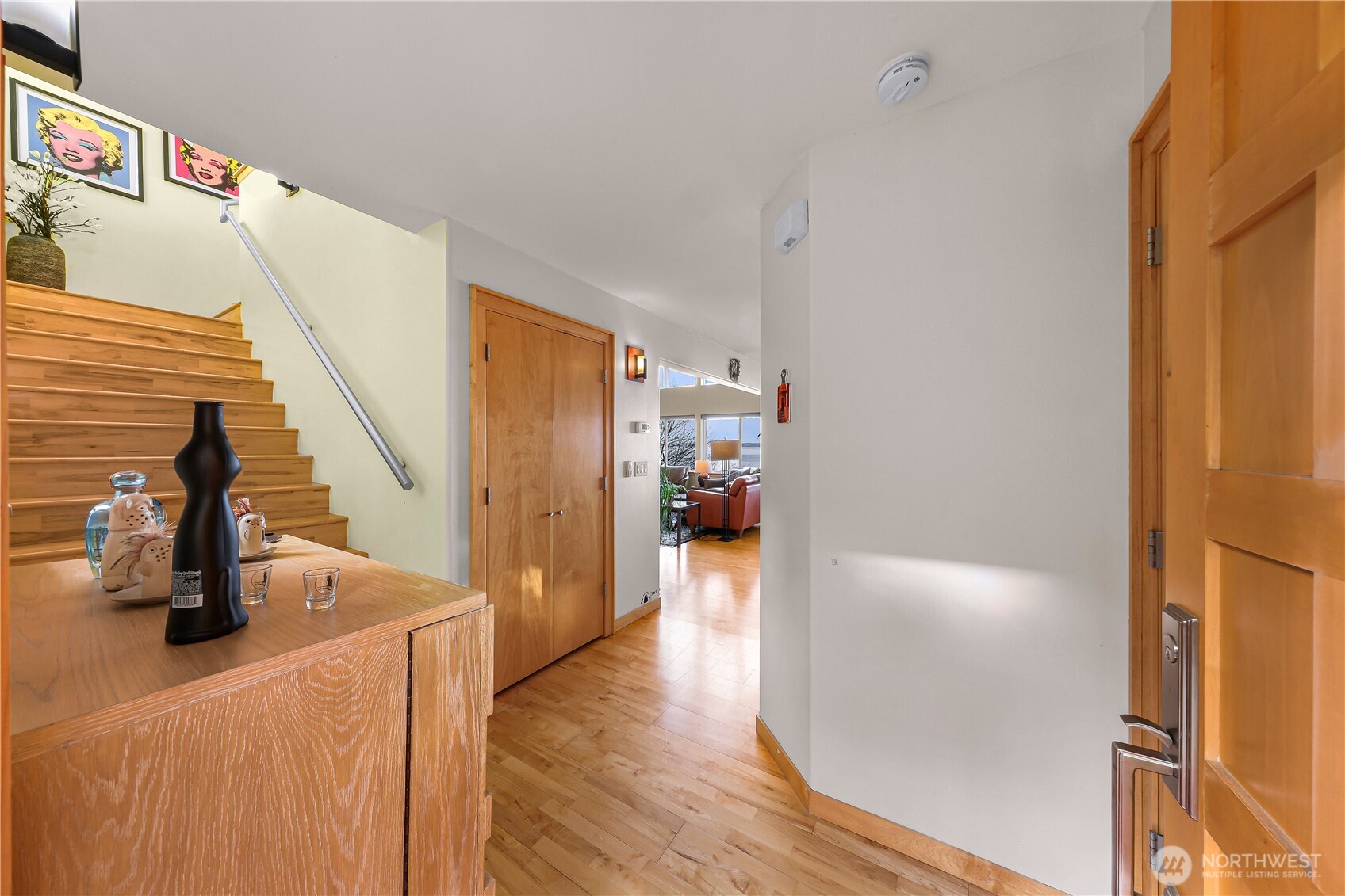 106 North State Street Bellingham, WA 98225 - Photo 18 of 34 a view of a hallway with wooden floor and staircase