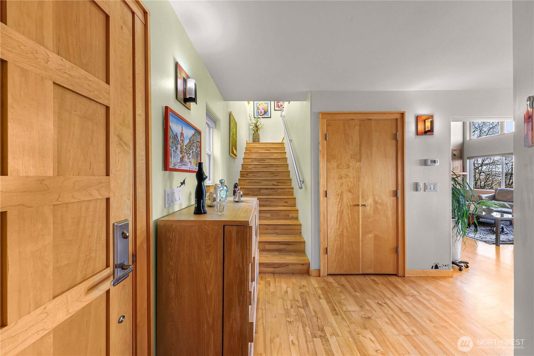 106 North State Street Bellingham, WA 98225 - Photo 2 of 34 a view of a hallway with wooden floor and staircase