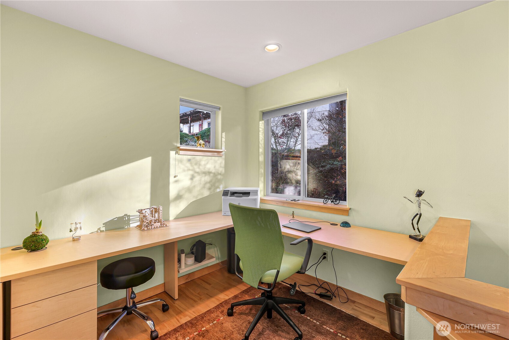 106 North State Street Bellingham, WA 98225 - Photo 22 of 34 a view of a workspace with furniture and a window