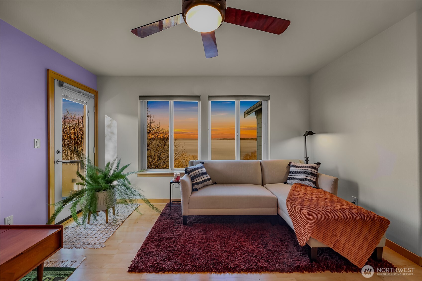 106 North State Street Bellingham, WA 98225 - Photo 23 of 34 a living room with furniture rug and a potted plant
