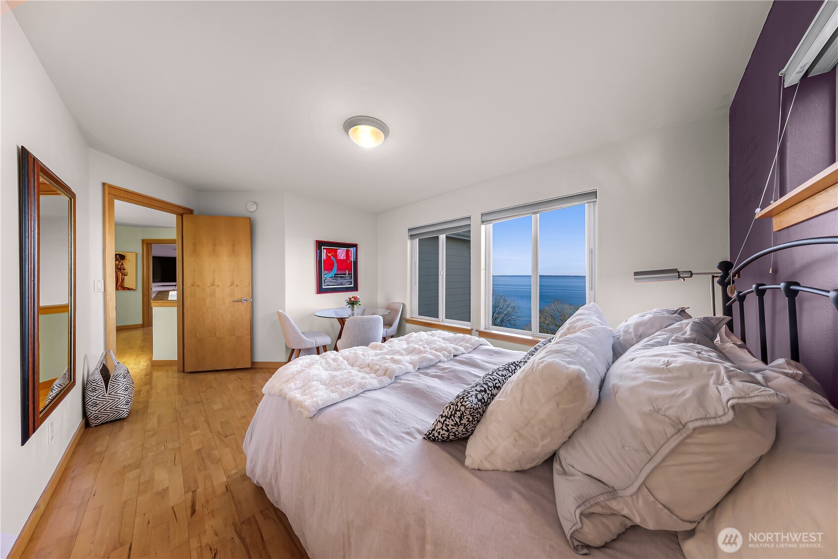 106 North State Street Bellingham, WA 98225 - Photo 26 of 34 a bedroom with a bed and a flat screen tv