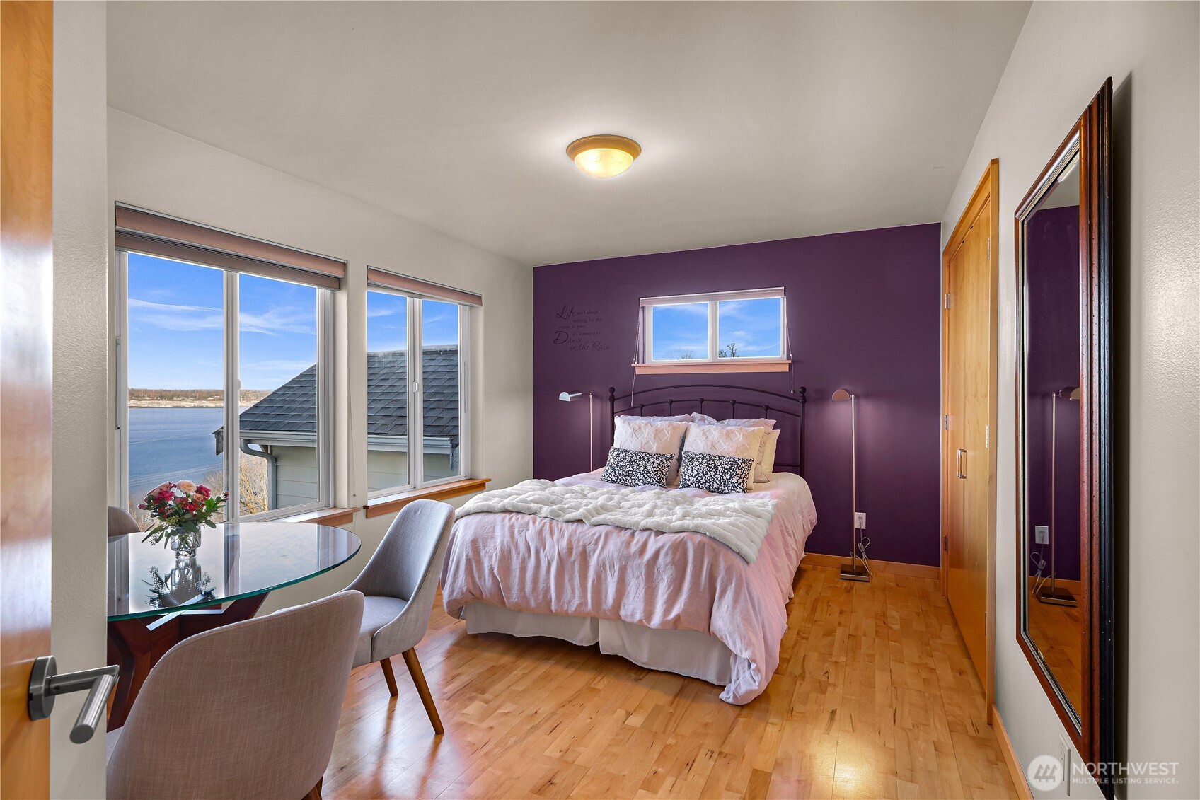 106 North State Street Bellingham, WA 98225 - Photo 27 of 34 a bedroom with a bed and wooden floor
