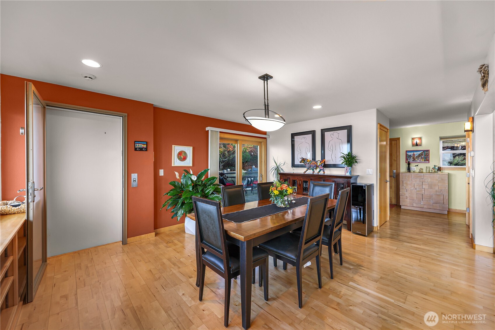 106 North State Street Bellingham, WA 98225 - Photo 4 of 34 a view of a dining room with furniture and wooden floor