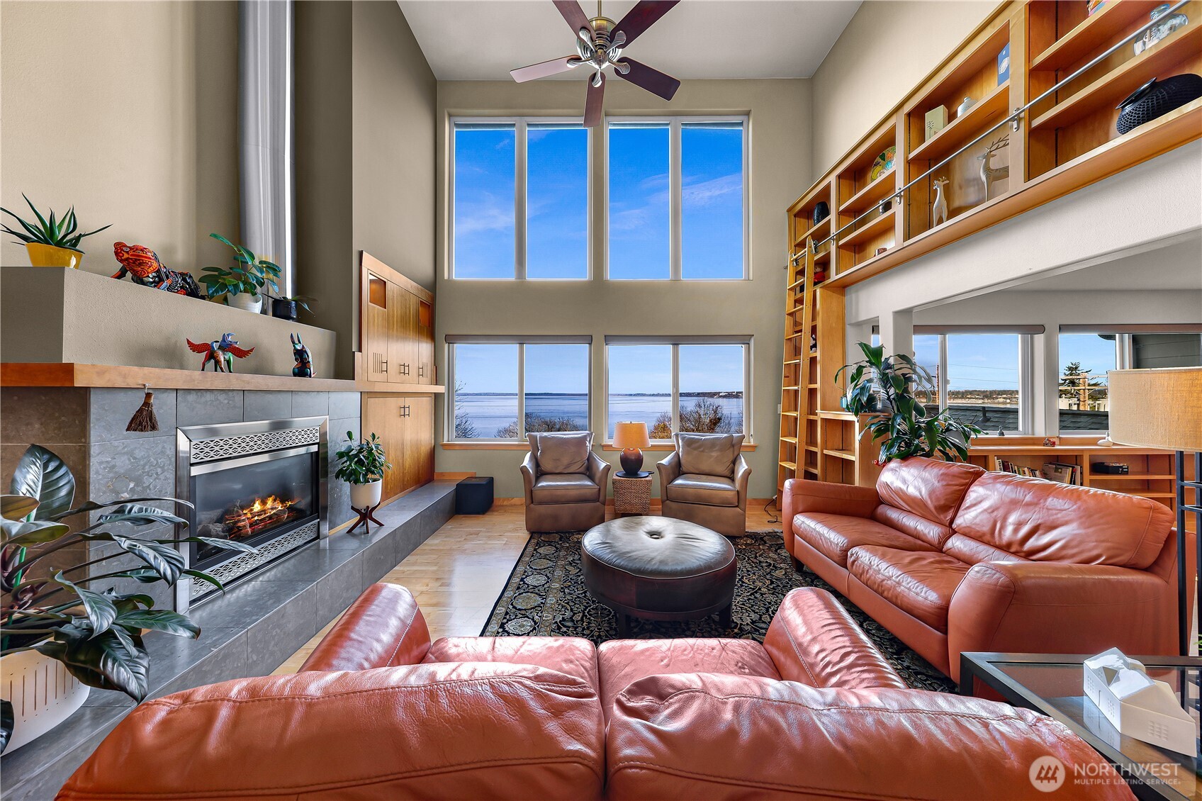 106 North State Street Bellingham, WA 98225 - Photo 7 of 34 a living room with furniture a fireplace and a window