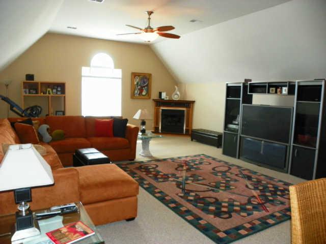 732 Heritage Road Lebanon, TN 37087 - Photo 14 of 20 a living room with a couch and a fireplace