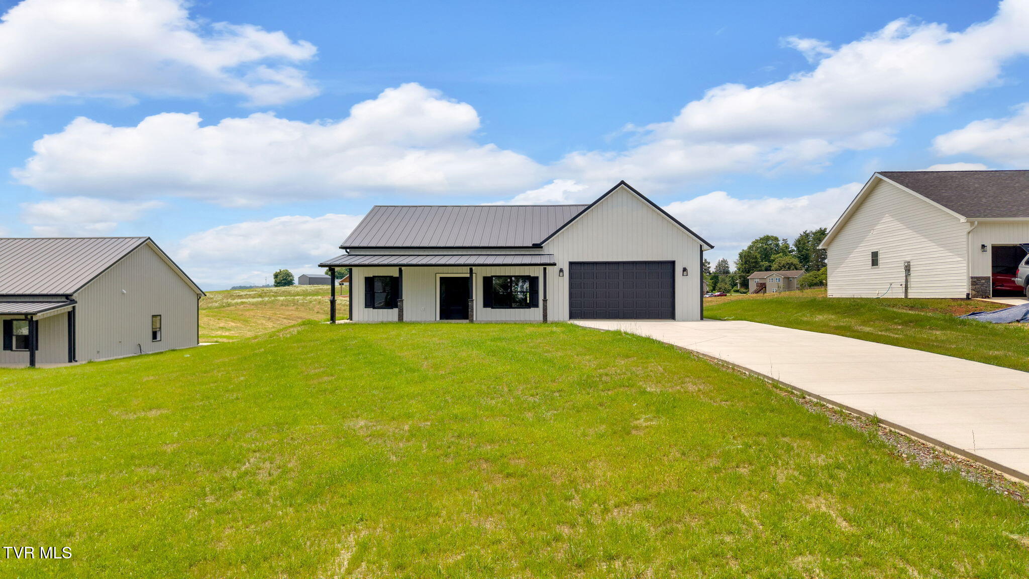 1930 Erwin Highway Greeneville, TN 37745 - Photo 2 of 36 1-web-or-mls-DJI_20250613132007_0869_D