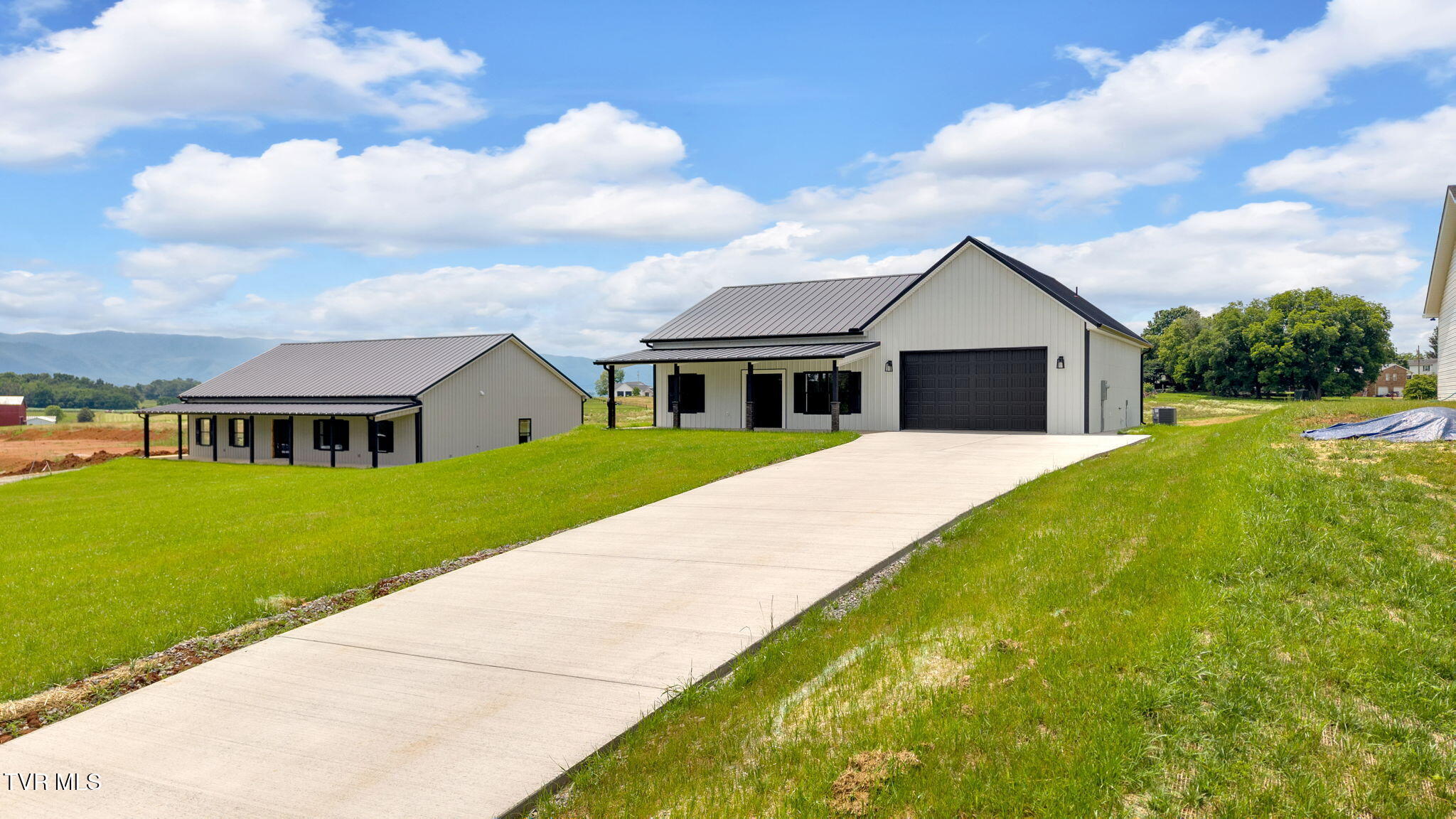 1930 Erwin Highway Greeneville, TN 37745 - Photo 4 of 36 13-web-or-mls-DJI_20250613132015_0872_D