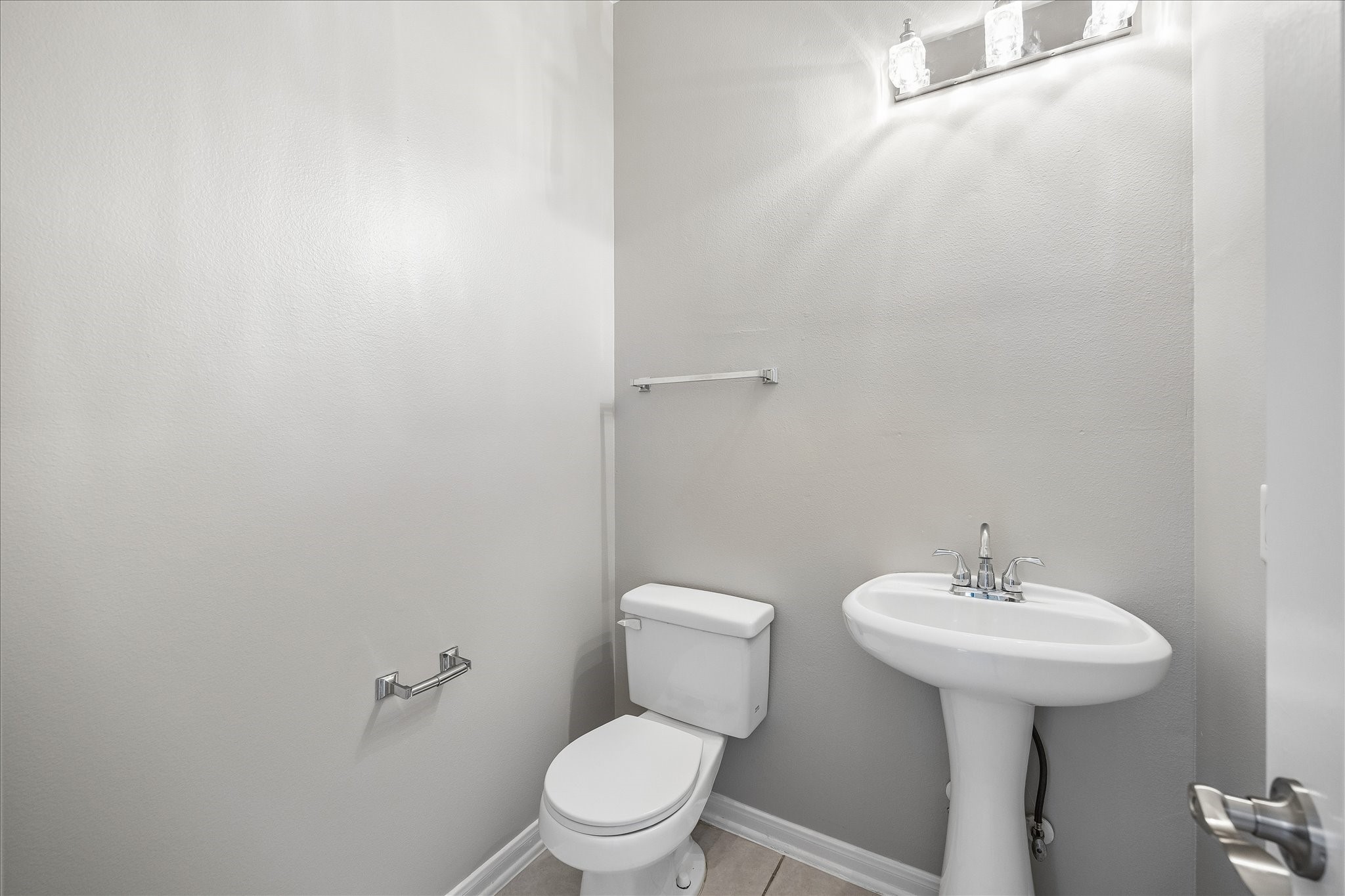 23226 Postwood Park Lane Spring, TX 77373 - Photo 14 of 28 half bathroom downstairs