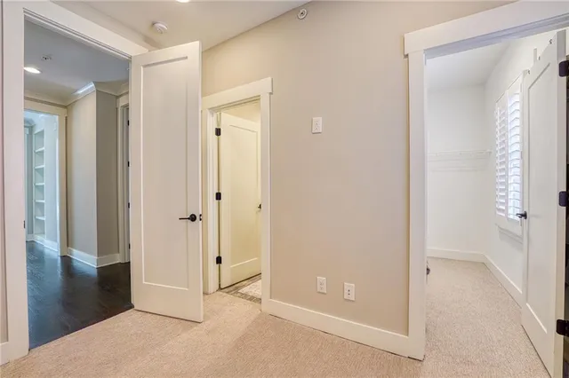 a view of a bathroom with a glass shower door