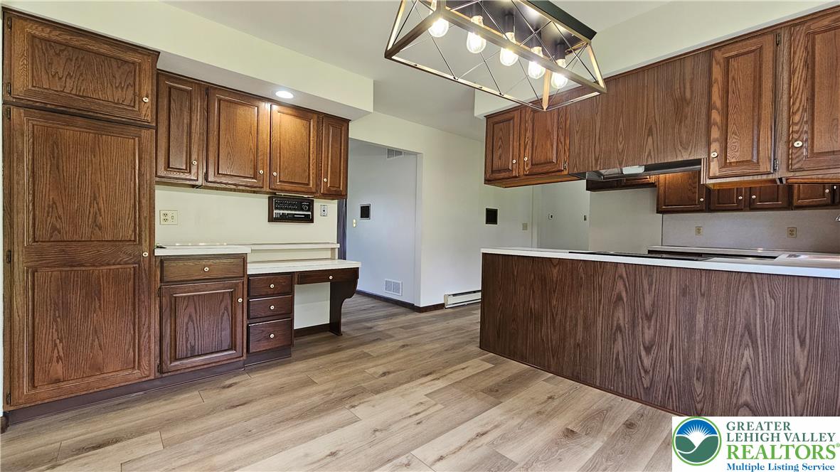 2810 County Line Road Riegelsville, PA 18077 - Photo 1 of 7 A classic kitchen with abundant wood cabinetry offers both style and practicality.
