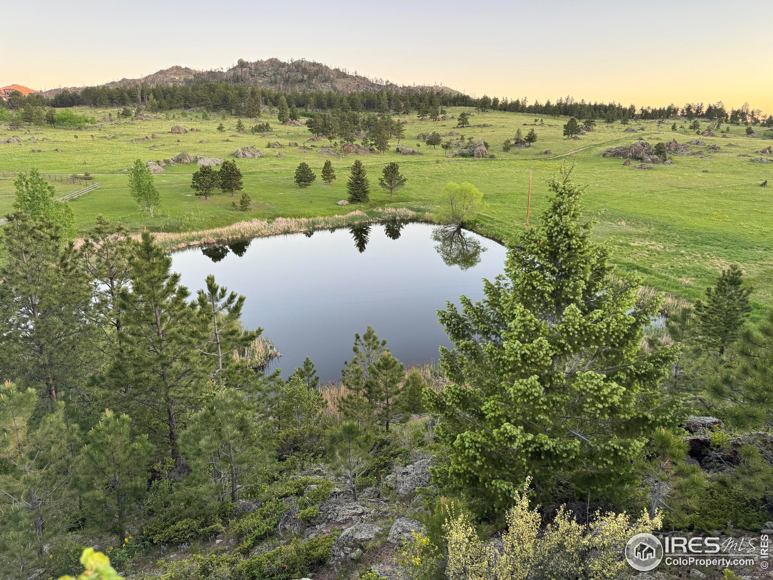 9200 Old Flowers Road Bellvue, CO 80512 - Photo 12 of 50 a view of lake with a mountain in the background