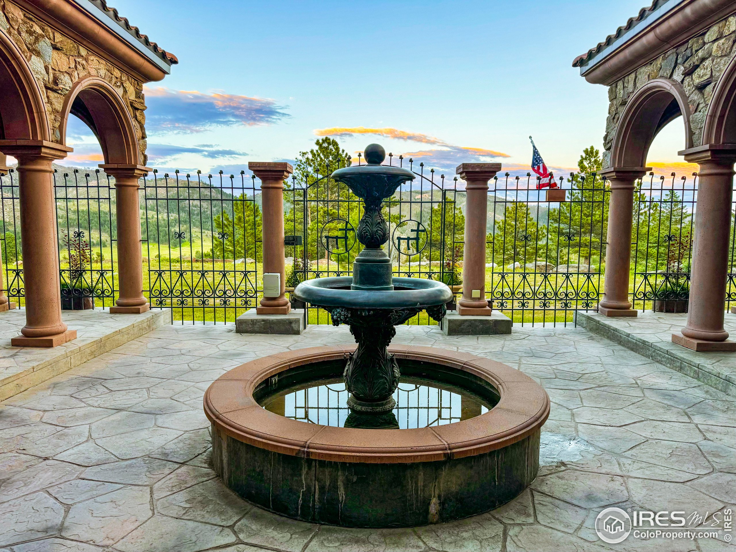 9200 Old Flowers Road Bellvue, CO 80512 - Photo 15 of 50 a view of a fountain in the patio of a house