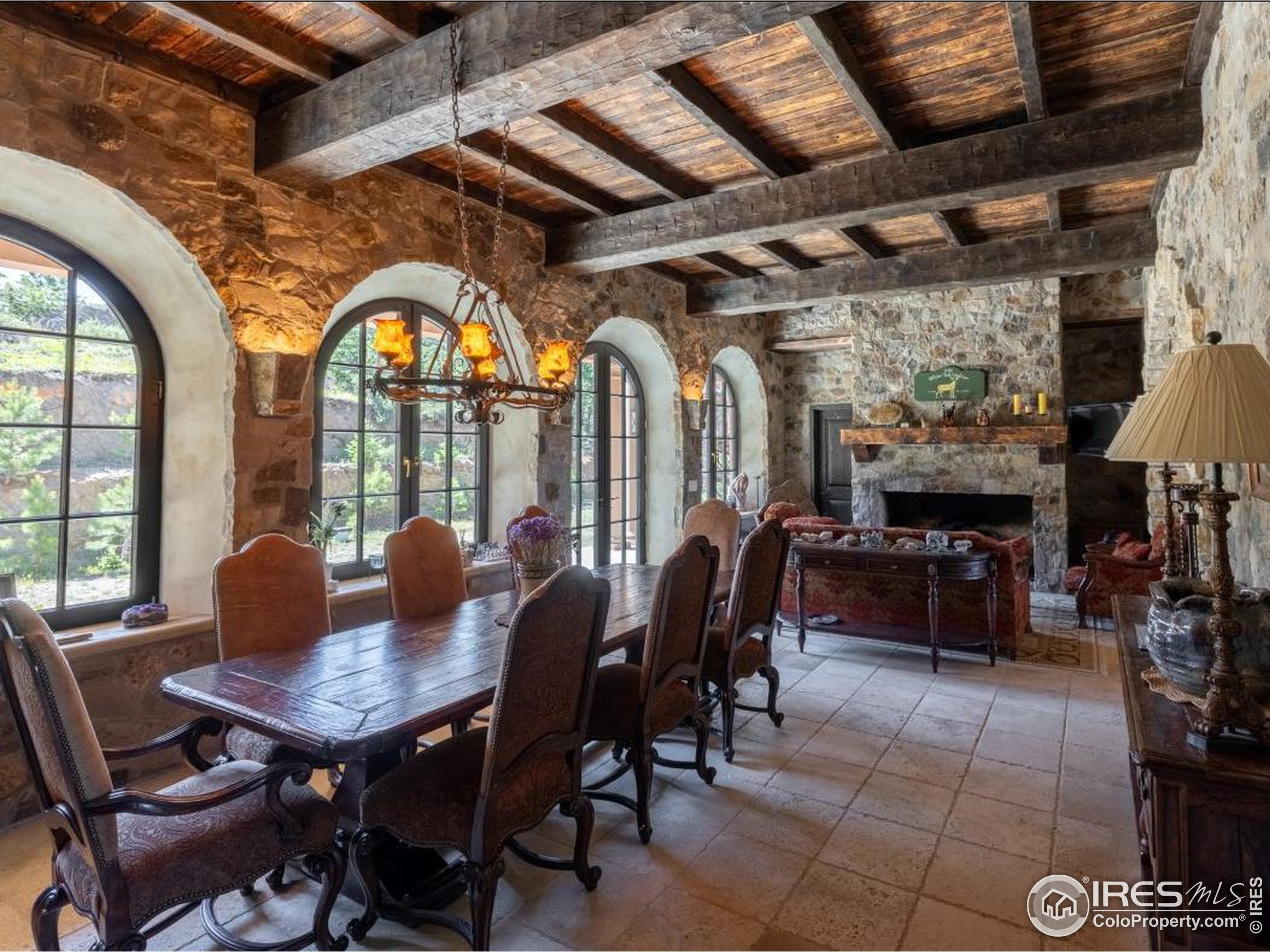 9200 Old Flowers Road Bellvue, CO 80512 - Photo 17 of 50 a view of a dining room with furniture window and outside view