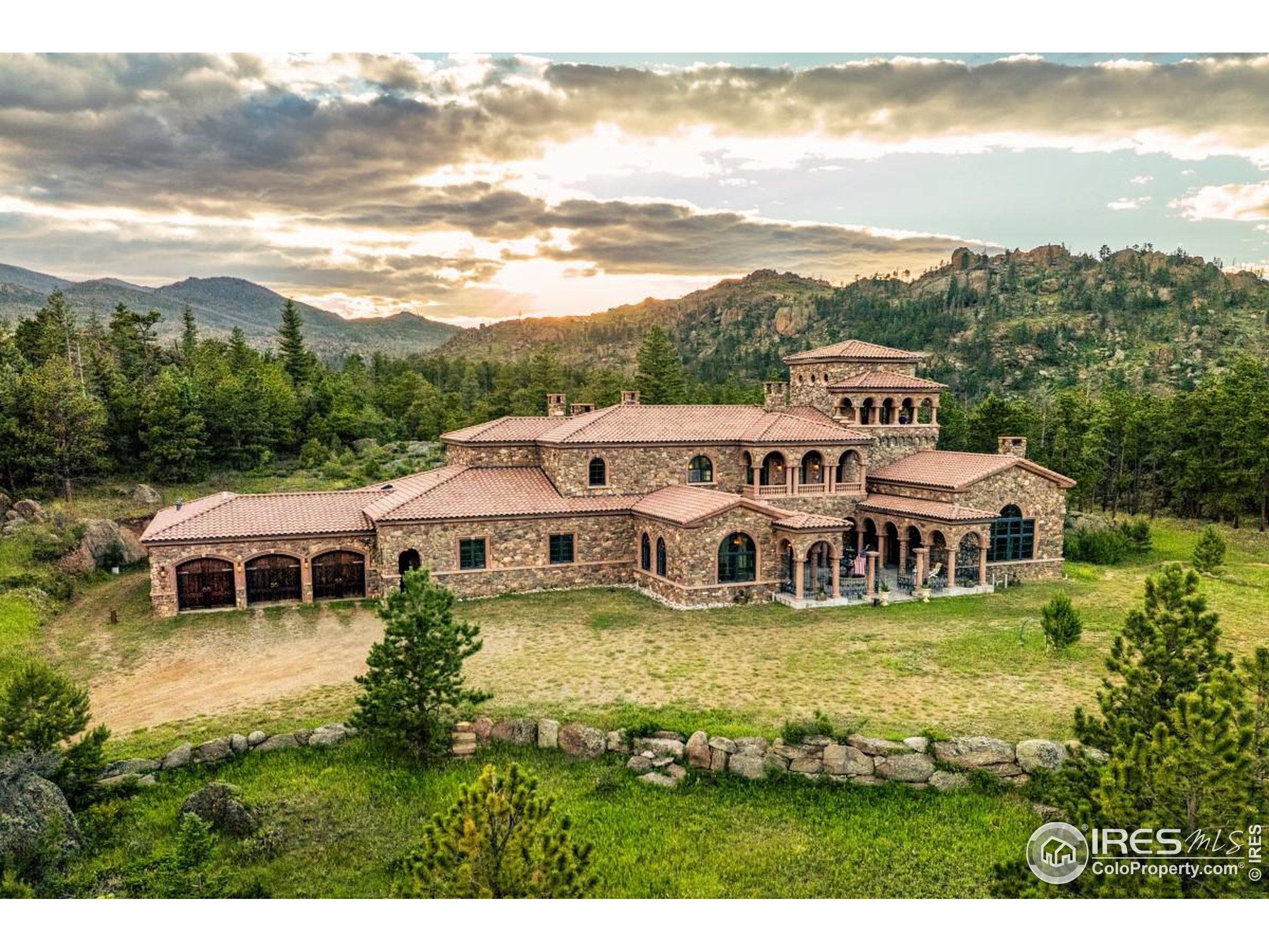 9200 Old Flowers Road Bellvue, CO 80512 - Photo 2 of 50 a view of a house with pool and ocean view
