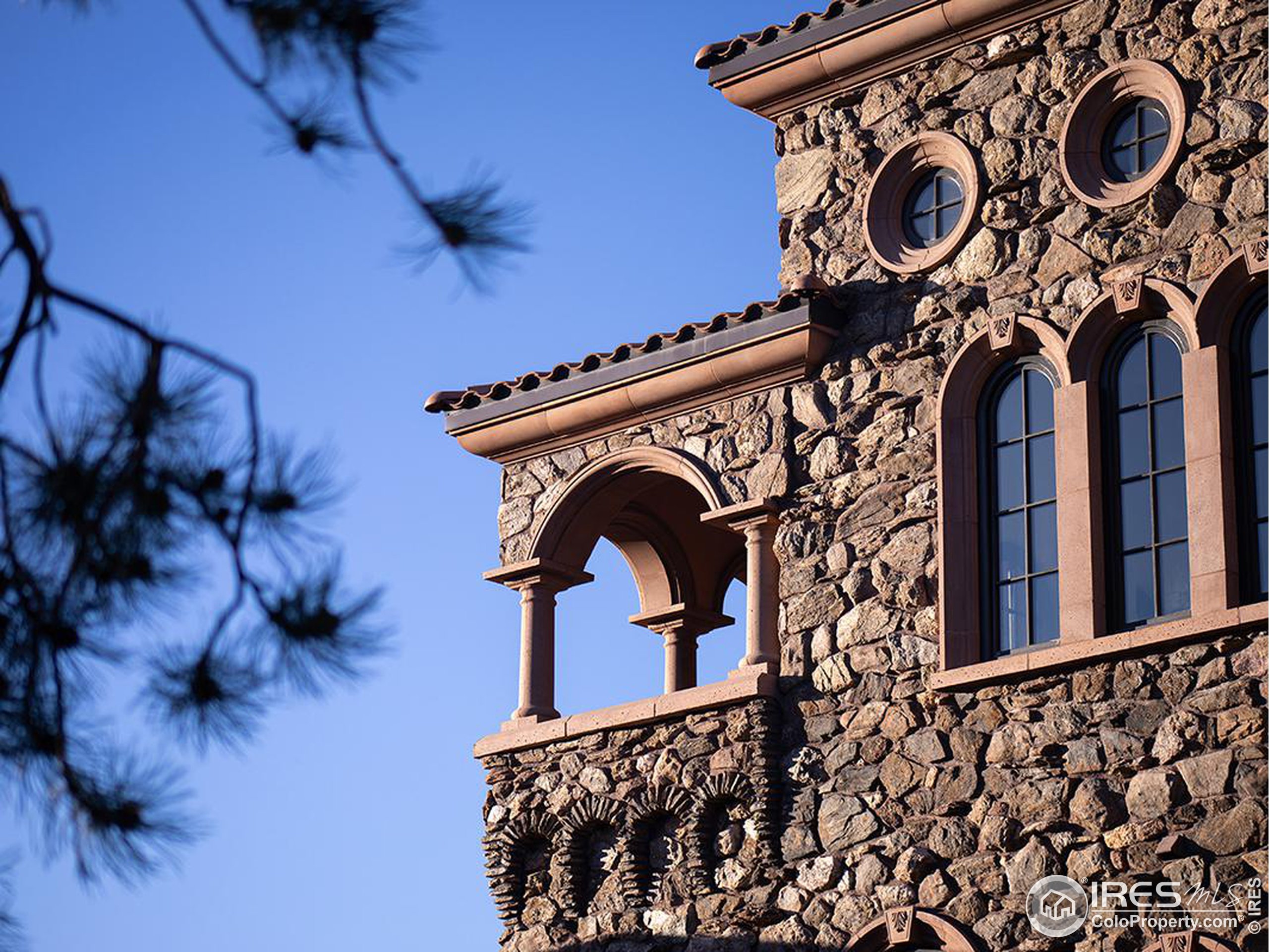 9200 Old Flowers Road Bellvue, CO 80512 - Photo 39 of 50 a view of an entryway with a lot of frames on wall and a window