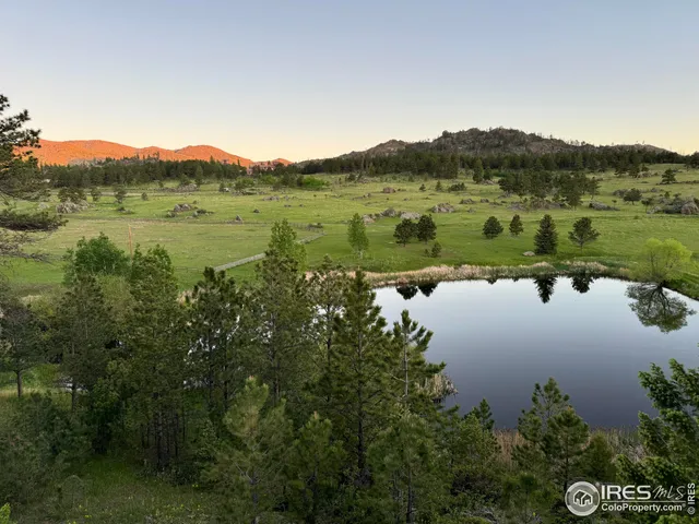 a view of a lake with a mountain