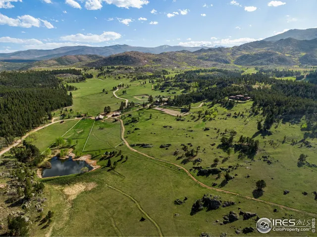 a view of lake with a mountain in the background