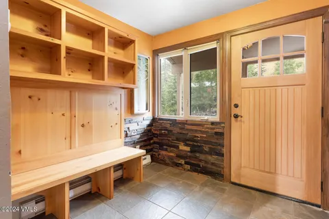a room with window and furniture