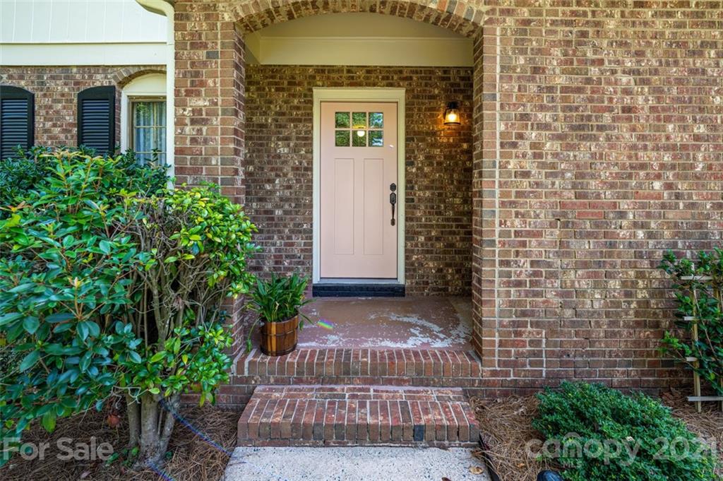 10017 Sardis Oaks Road Charlotte, NC 28270 - Photo 2 of 31 a view of entrance gate of a house