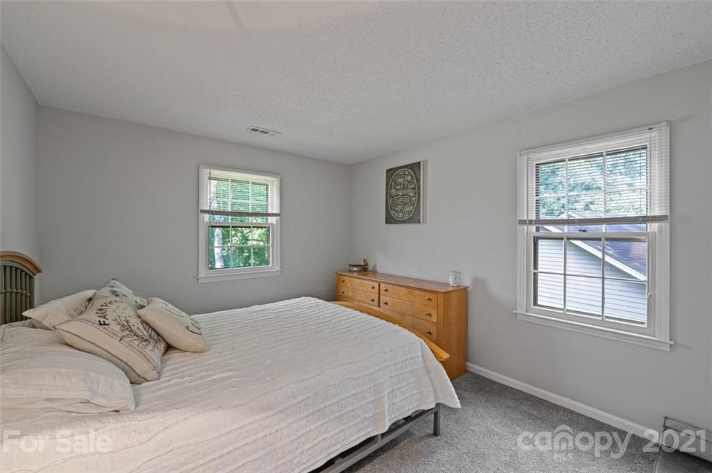 10017 Sardis Oaks Road Charlotte, NC 28270 - Photo 16 of 31 a bedroom with a bed and a window