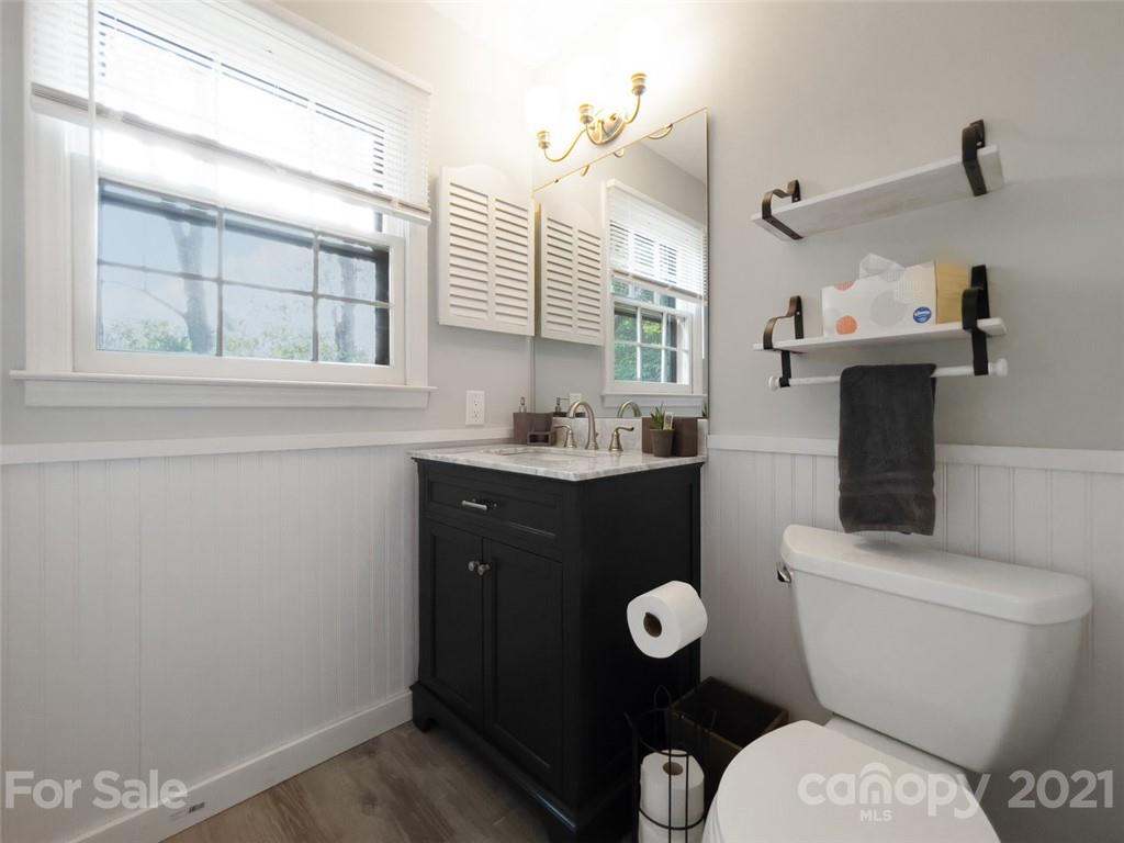 10017 Sardis Oaks Road Charlotte, NC 28270 - Photo 20 of 31 a bathroom with a sink and a toilet
