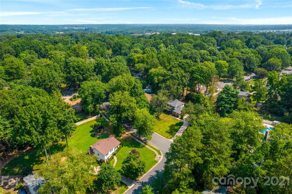10017 Sardis Oaks Road Charlotte, NC 28270 - Photo 31 of 31 an aerial view of residential houses with outdoor space and trees all around