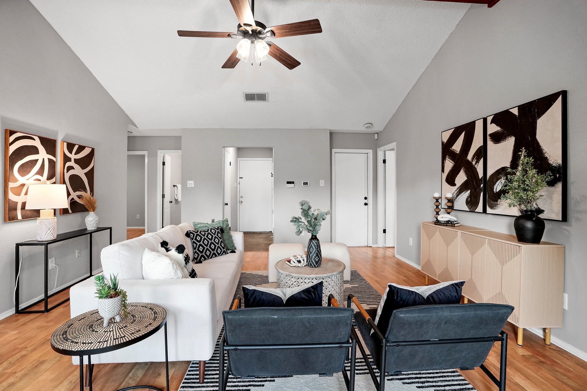 3805 Tamil Street Austin, TX 78749 - Photo 13 of 27 a view of a dining room with furniture and wooden floor