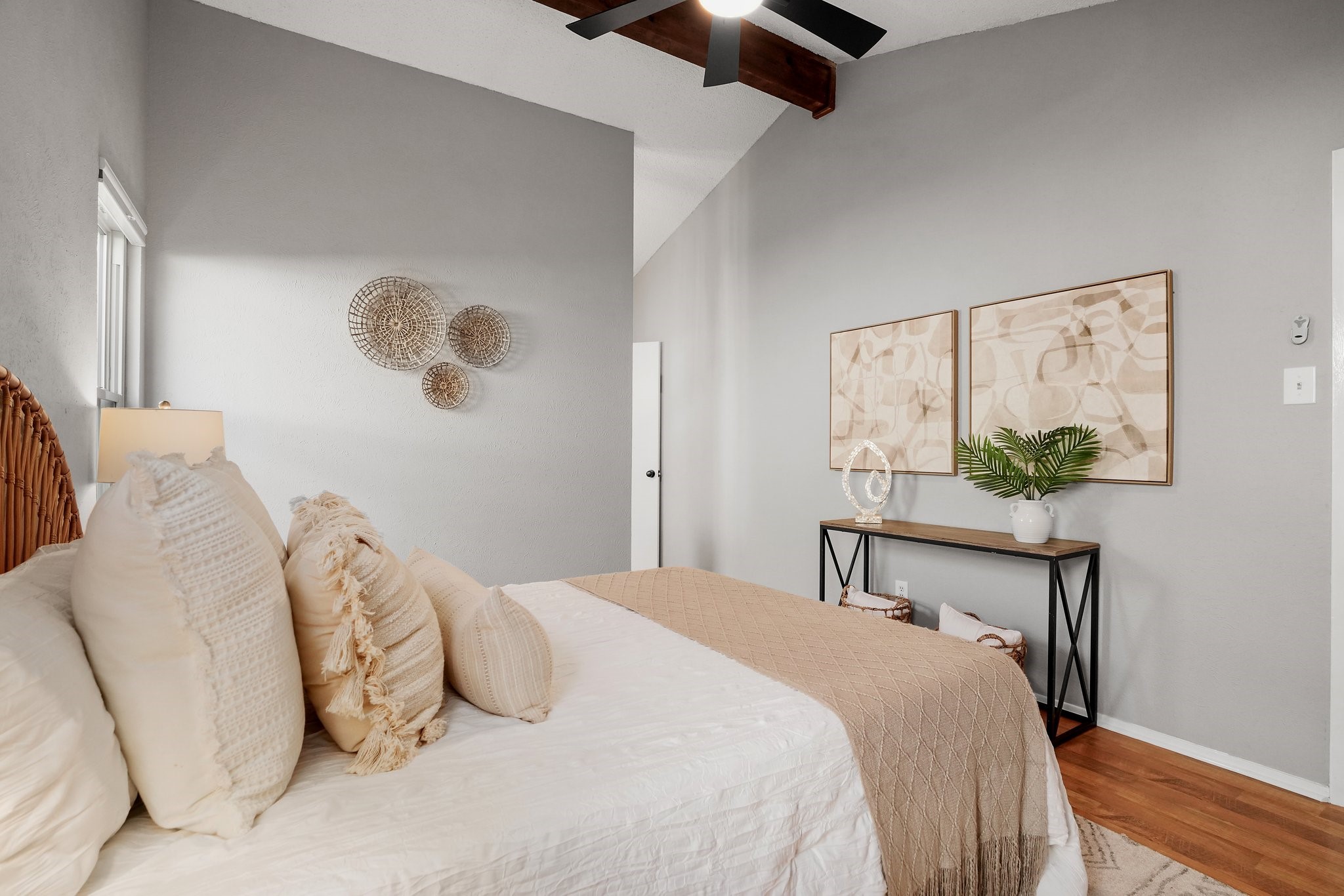 3805 Tamil Street Austin, TX 78749 - Photo 18 of 27 a bedroom with a bed and a potted plant