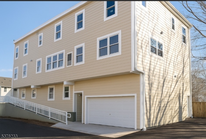 204 Bloomfield Avenue, Unit A Montclair, NJ 07042 - Photo 1 of 9 a front view of a house with a garage