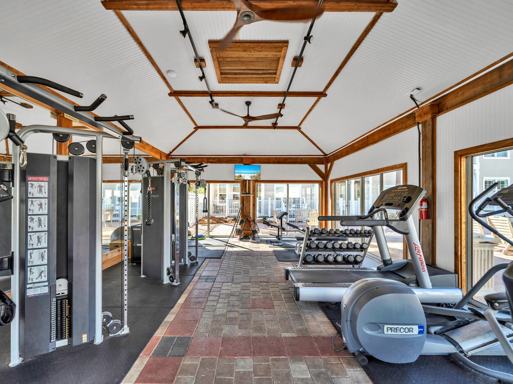 117 Village Boulevard, Unit 711 Santa Rosa Beach, FL 32459 - Photo 32 of 47 a room with lots of gym equipment