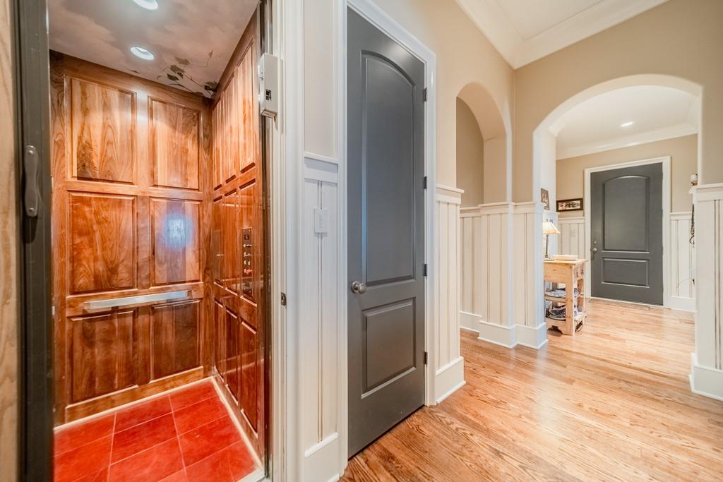 16339 Jetton Road Cornelius, NC 28031 - Photo 22 of 48 a view of a hallway with wooden floor and entryway