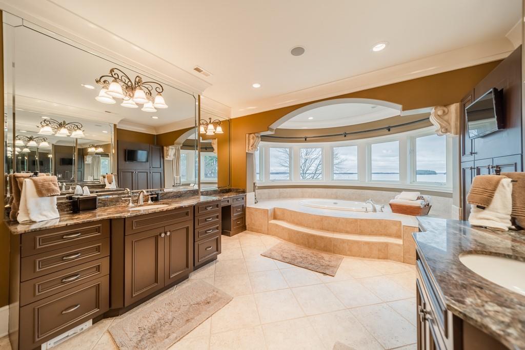16339 Jetton Road Cornelius, NC 28031 - Photo 27 of 48 a large white kitchen with a large window