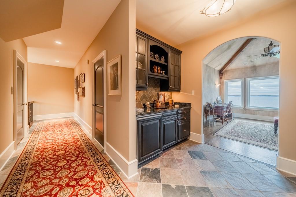 16339 Jetton Road Cornelius, NC 28031 - Photo 33 of 48 a kitchen with stainless steel appliances granite countertop a refrigerator and a sink