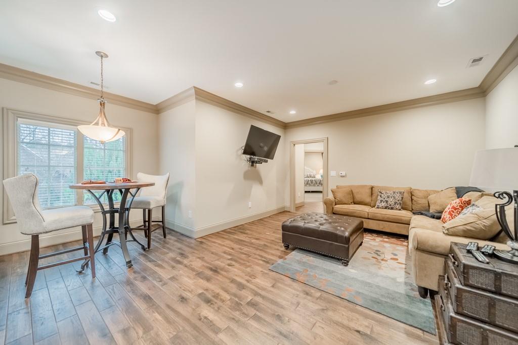 16339 Jetton Road Cornelius, NC 28031 - Photo 37 of 48 a living room with furniture and a wooden floor