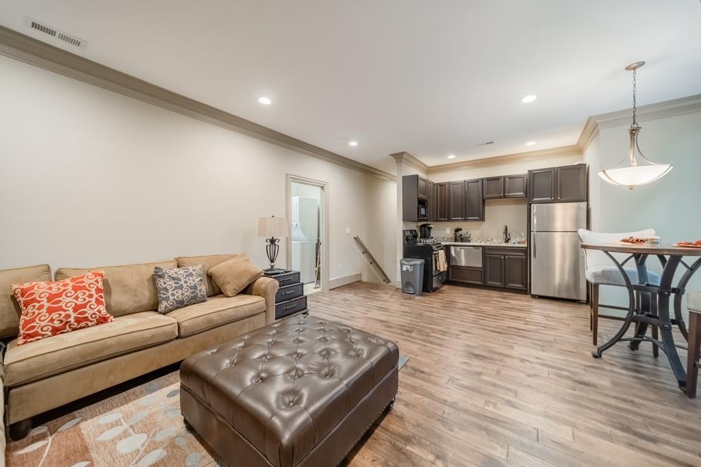 16339 Jetton Road Cornelius, NC 28031 - Photo 38 of 48 a living room with furniture and kitchen view