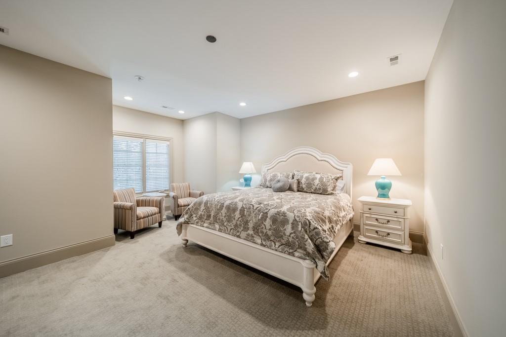 16339 Jetton Road Cornelius, NC 28031 - Photo 39 of 48 a spacious bedroom with a bed and a window