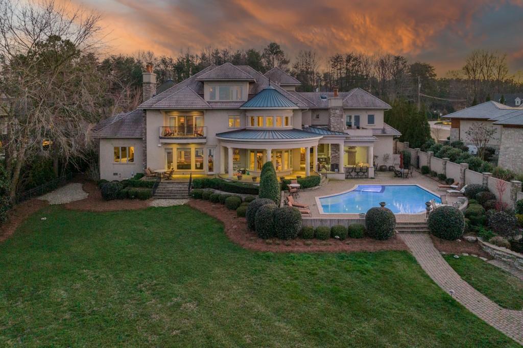 16339 Jetton Road Cornelius, NC 28031 - Photo 41 of 48 a front view of a house with a yard table and chairs