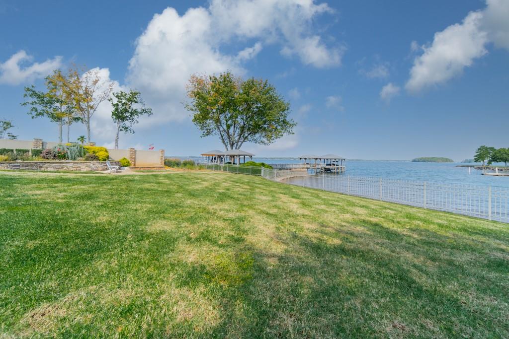 16339 Jetton Road Cornelius, NC 28031 - Photo 45 of 48 a swimming pool with wooden fence