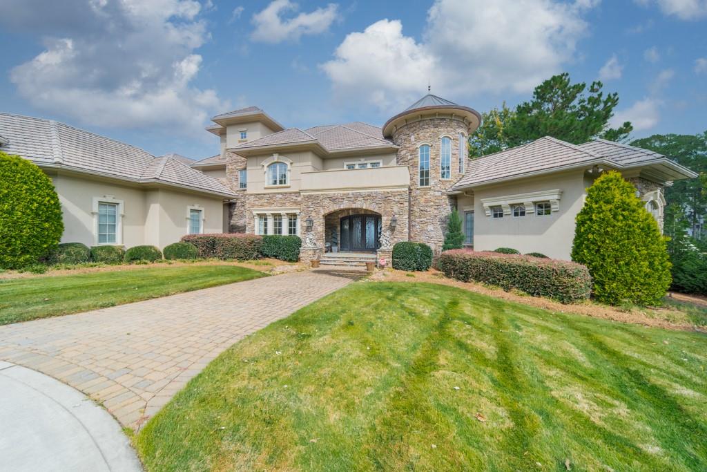 16339 Jetton Road Cornelius, NC 28031 - Photo 6 of 48 a view of a house with a yard and plants