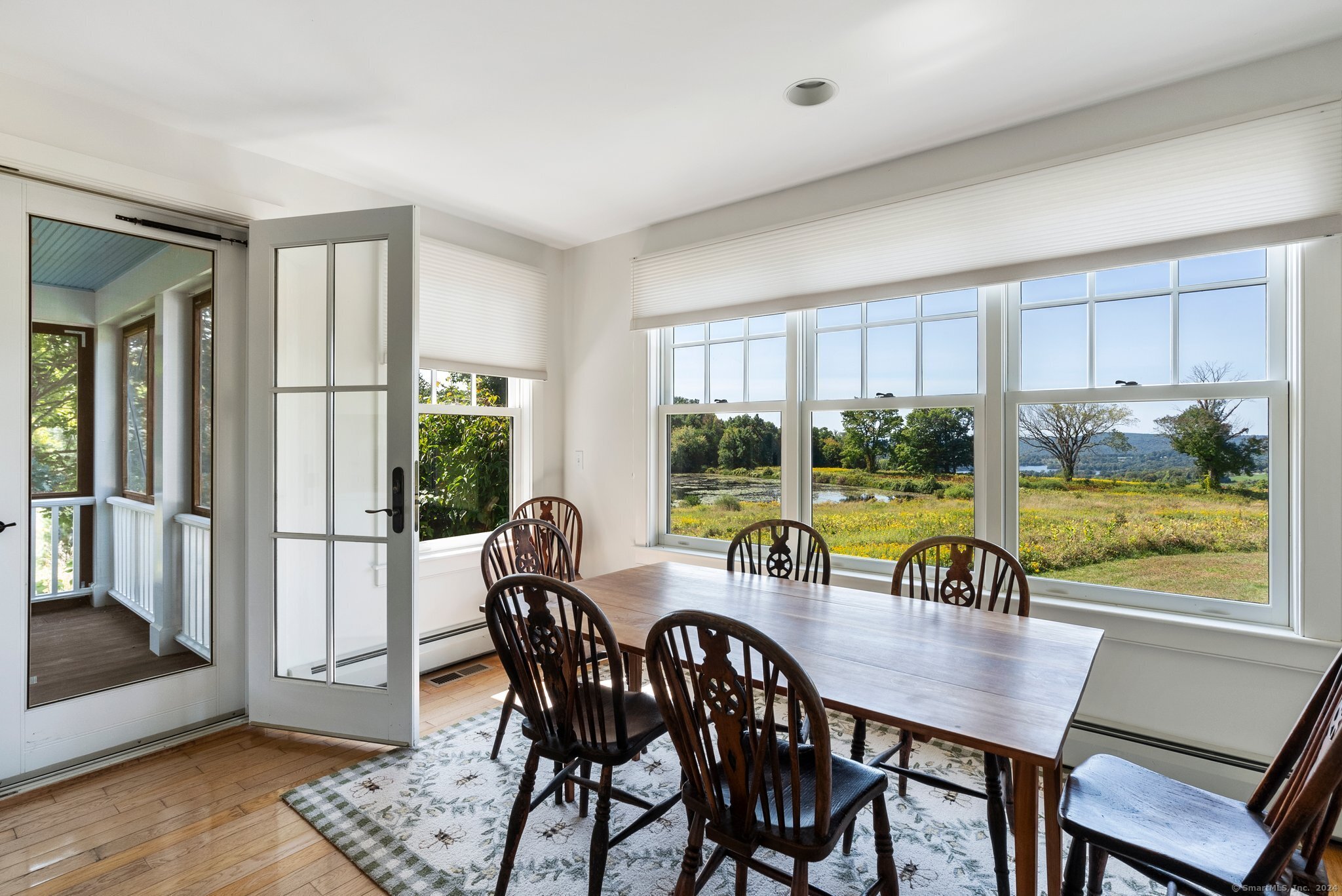 74 Tanner Hill Road Warren, CT 06777 - Photo 14 of 40 a view of a dining room with furniture window and outside view