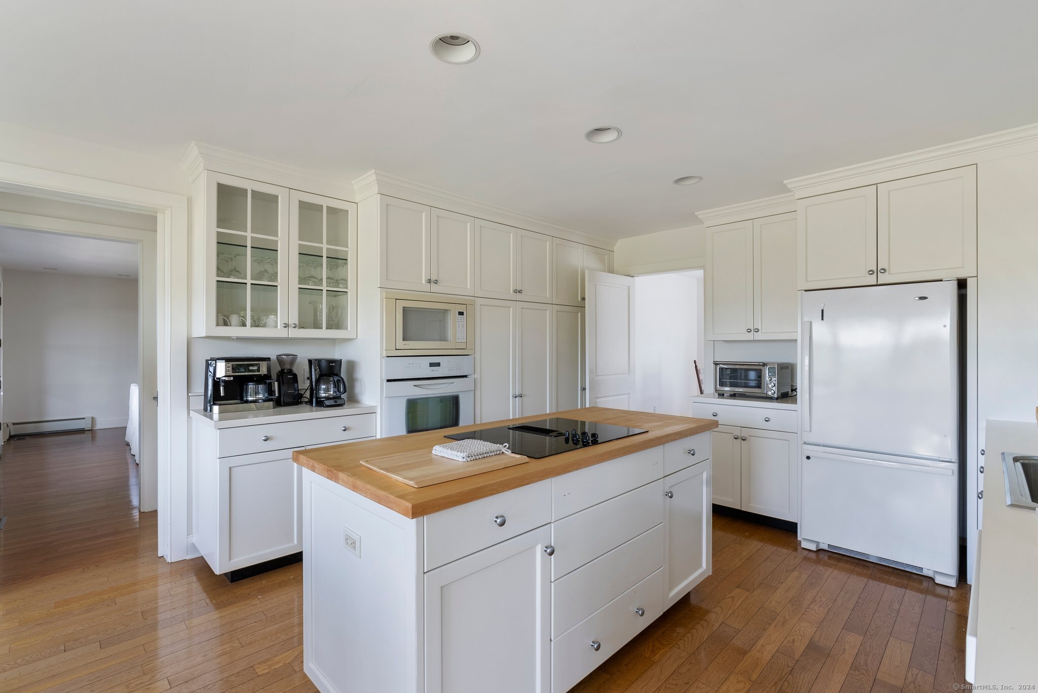74 Tanner Hill Road Warren, CT 06777 - Photo 15 of 40 a kitchen with a stove a refrigerator and a stove top oven