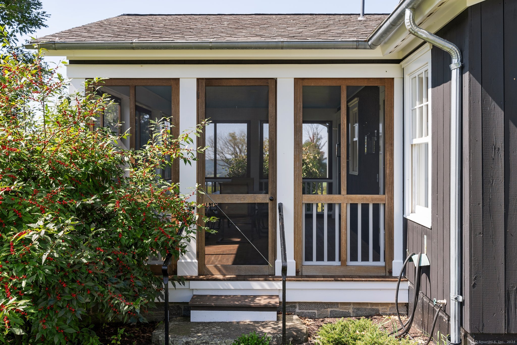 74 Tanner Hill Road Warren, CT 06777 - Photo 19 of 40 a view of a door of the house with a small porch