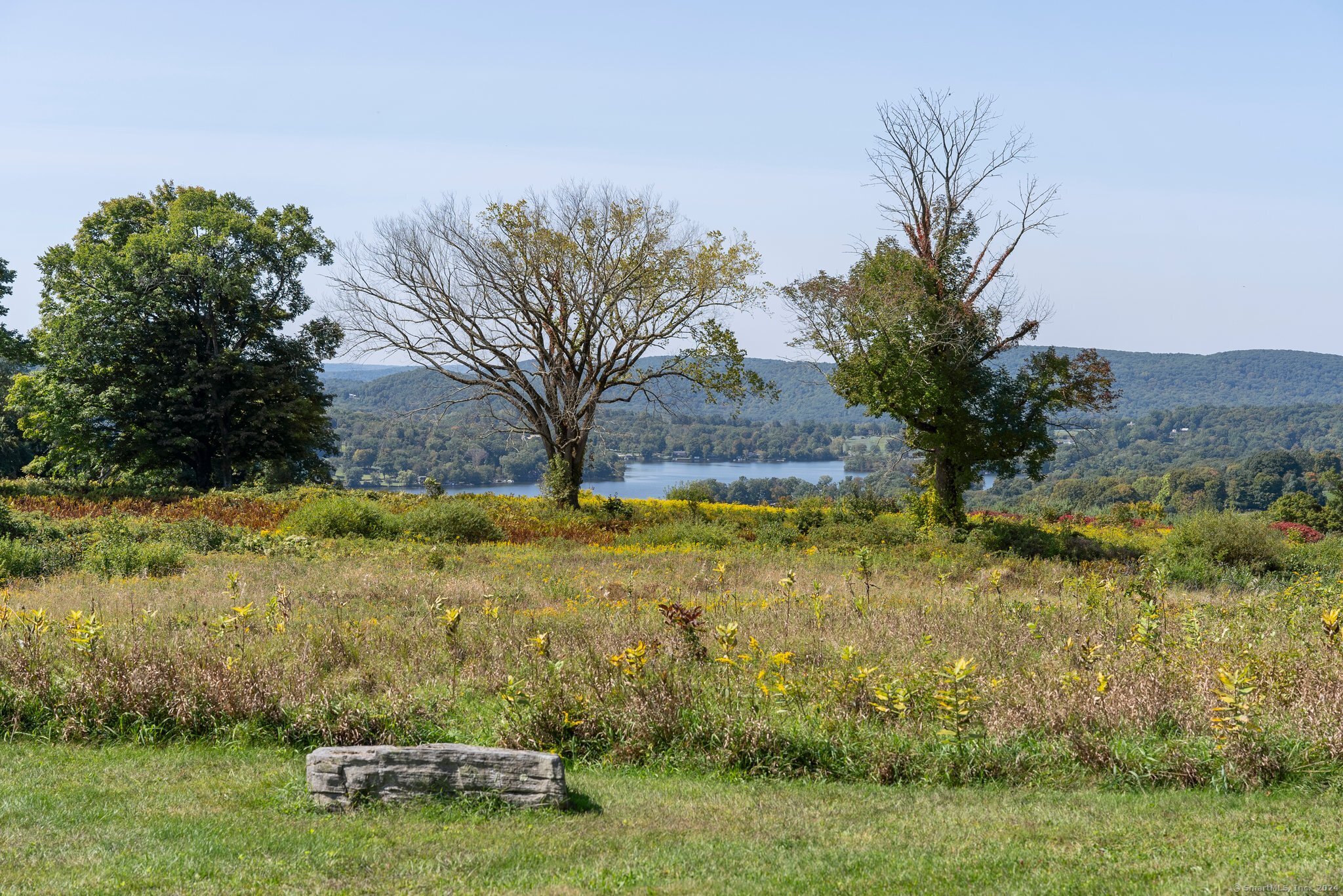 74 Tanner Hill Road Warren, CT 06777 - Photo 23 of 40 a view of a yard with an outdoor space