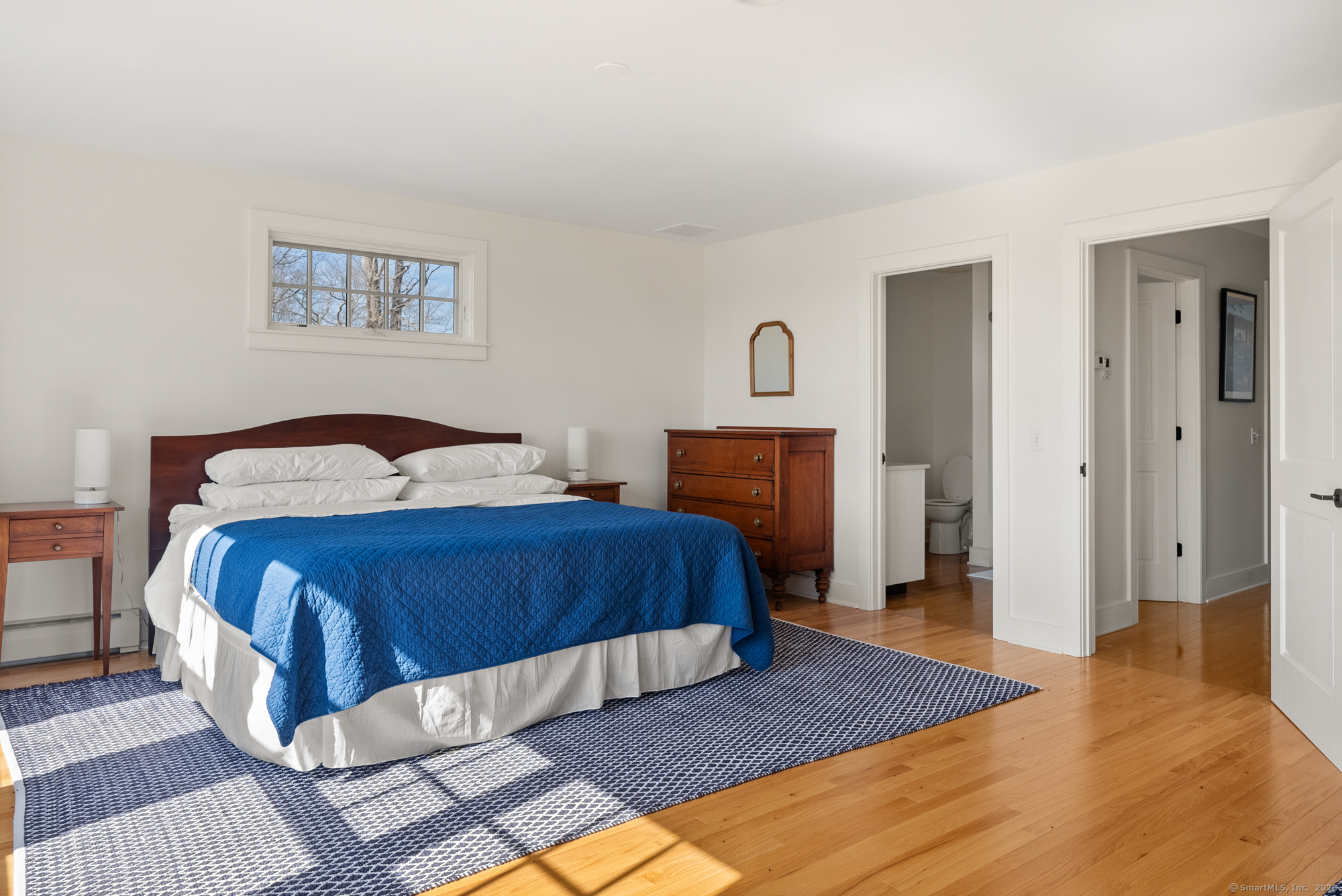 74 Tanner Hill Road Warren, CT 06777 - Photo 34 of 40 a bedroom with a bed and a couch