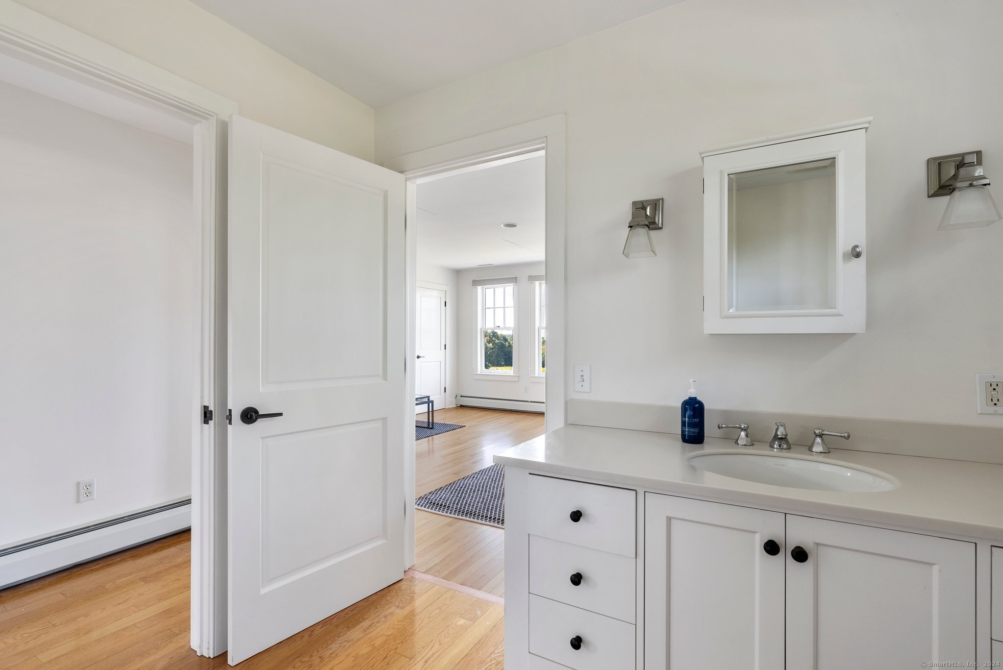 74 Tanner Hill Road Warren, CT 06777 - Photo 35 of 40 a bathroom with a sink a toilet and shower