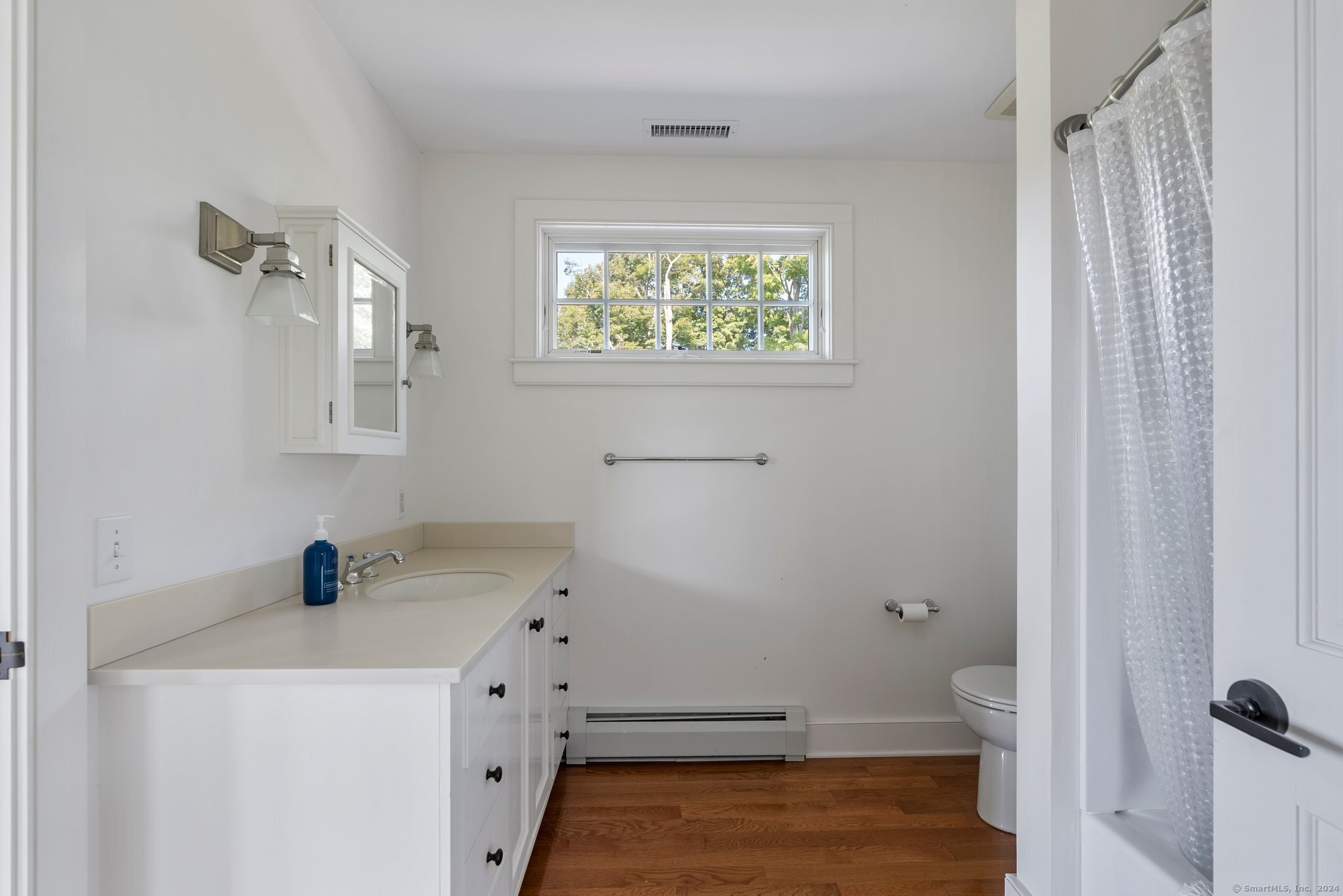 74 Tanner Hill Road Warren, CT 06777 - Photo 36 of 40 a bathroom with a sink toilet and shower