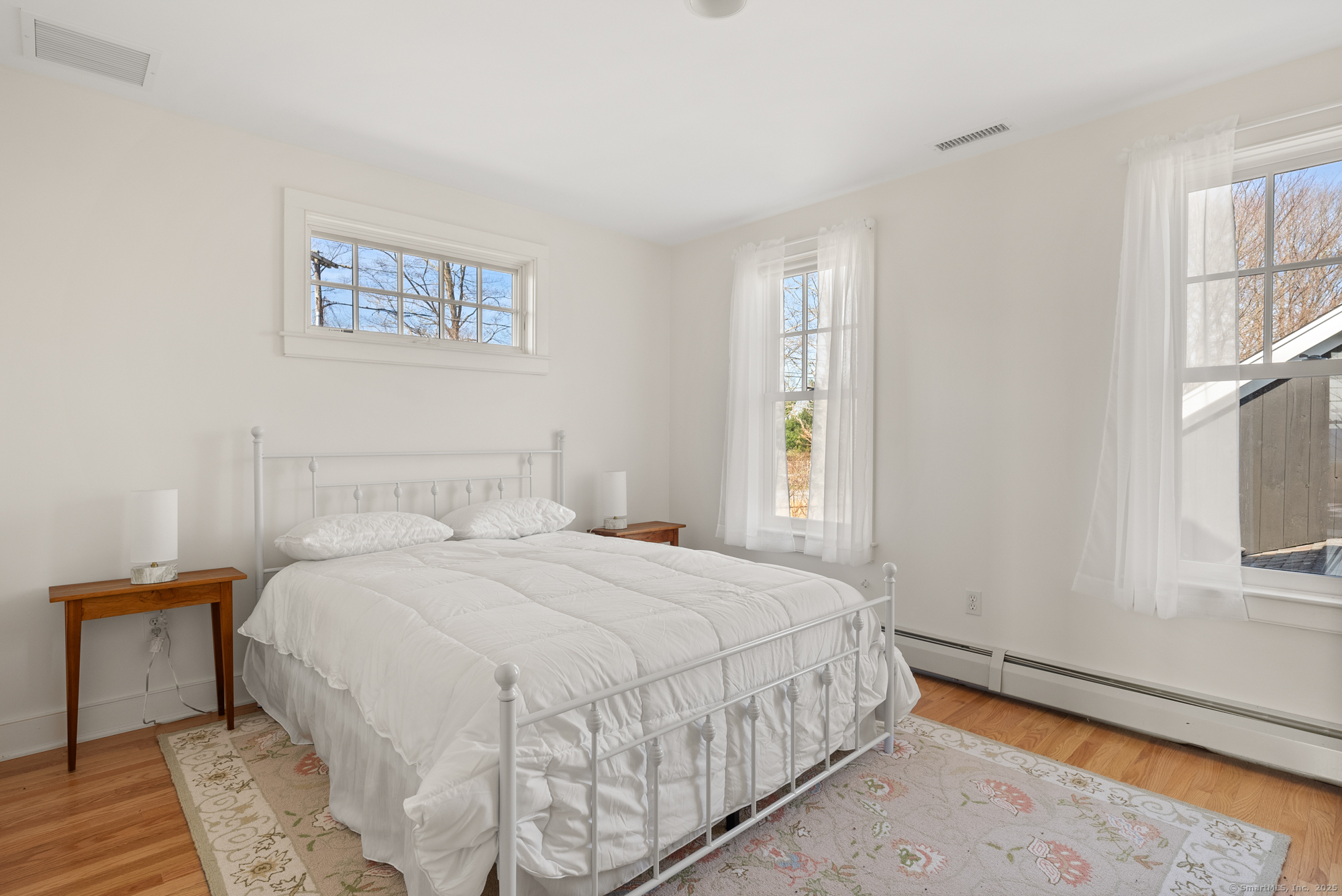 74 Tanner Hill Road Warren, CT 06777 - Photo 37 of 40 a bedroom with a bed and a window