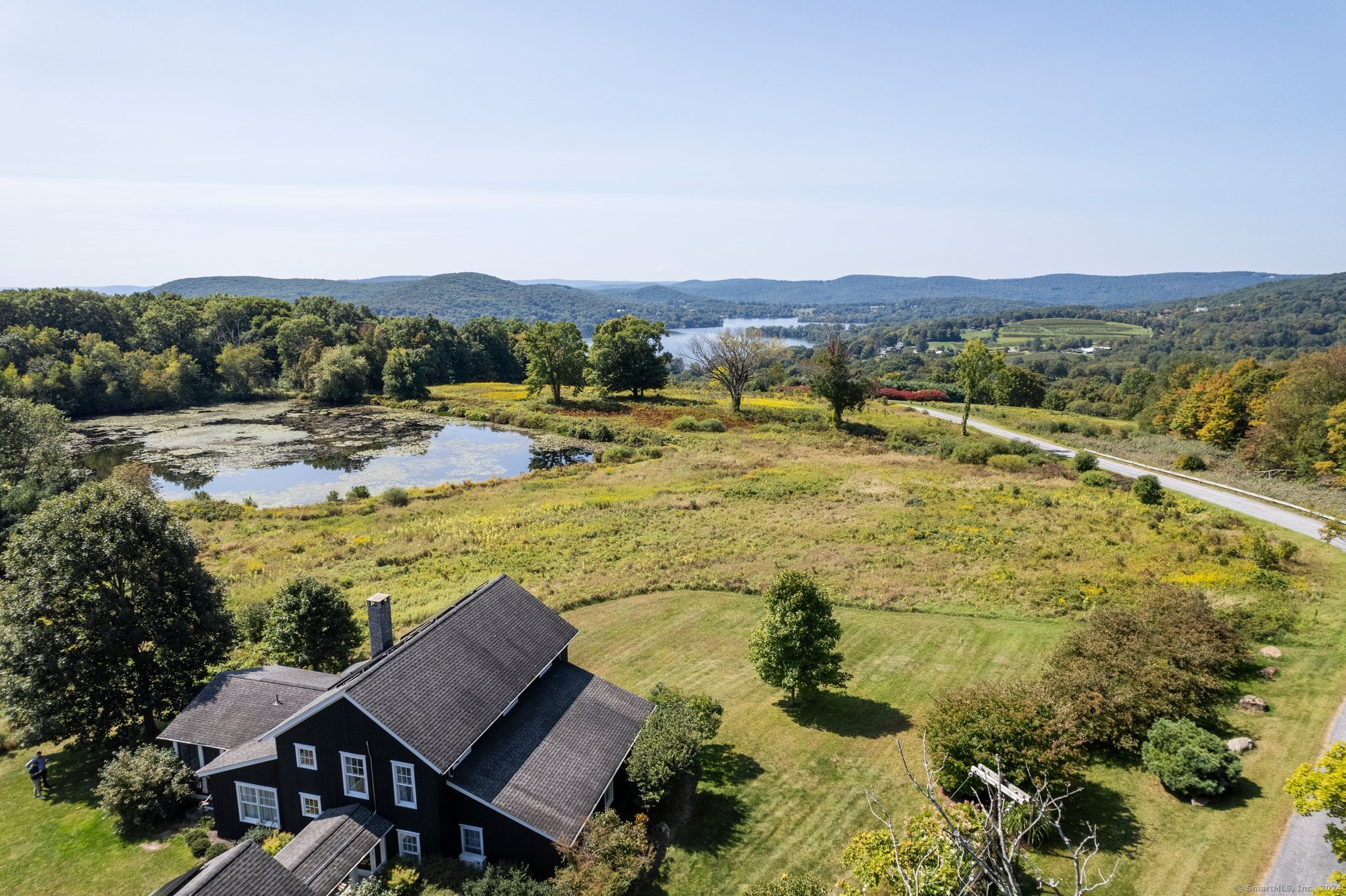 74 Tanner Hill Road Warren, CT 06777 - Photo 38 of 40 a view of a swimming pool and lounge chair