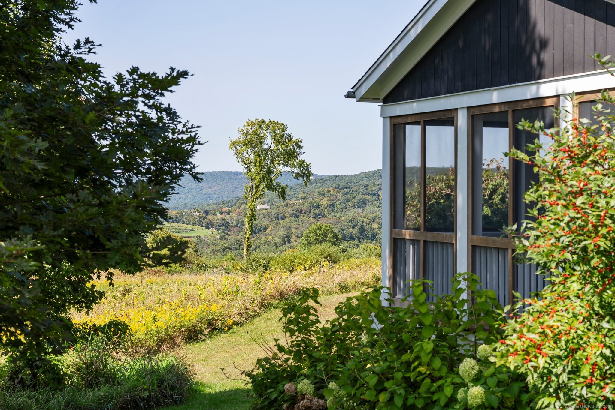 74 Tanner Hill Road Warren, CT 06777 - Photo 7 of 40 a plant is in front of a house