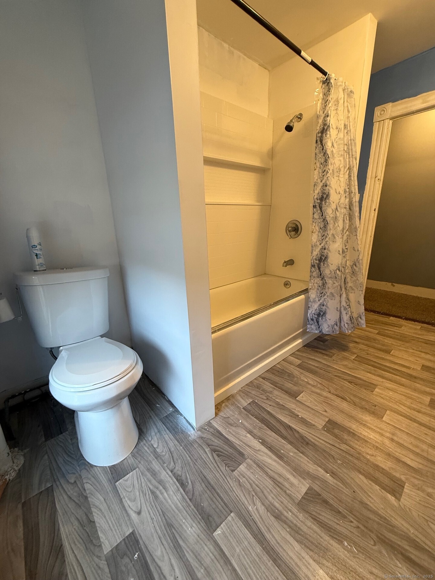 79 River Street, Unit 79 Sprague, CT 06330 - Photo 19 of 25 a bathroom with a toilet and a shower